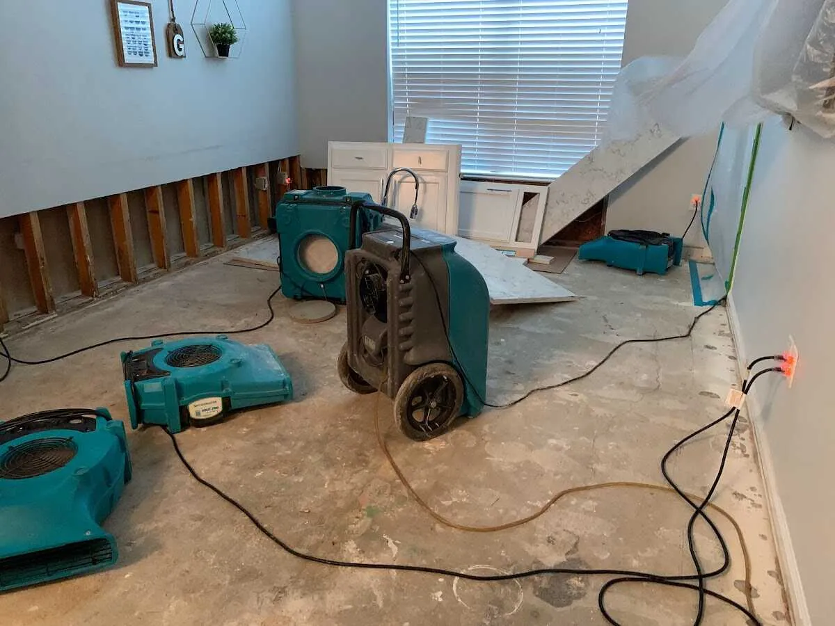 Dehumidifier in flood-cut room for Water Damage Restoration in Chatham